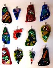 Assorted Dichroic glass pendants are made to match any outfit