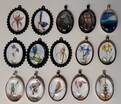 Large Oval 'Picture Pendants', 30x40mm, assorted metal mounts, domed glass cabochon, on cord.