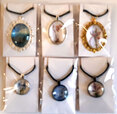'Picture Pendants' packaged for sale.